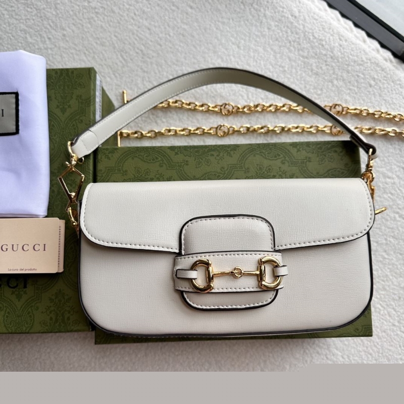 G*u*i top handle bags